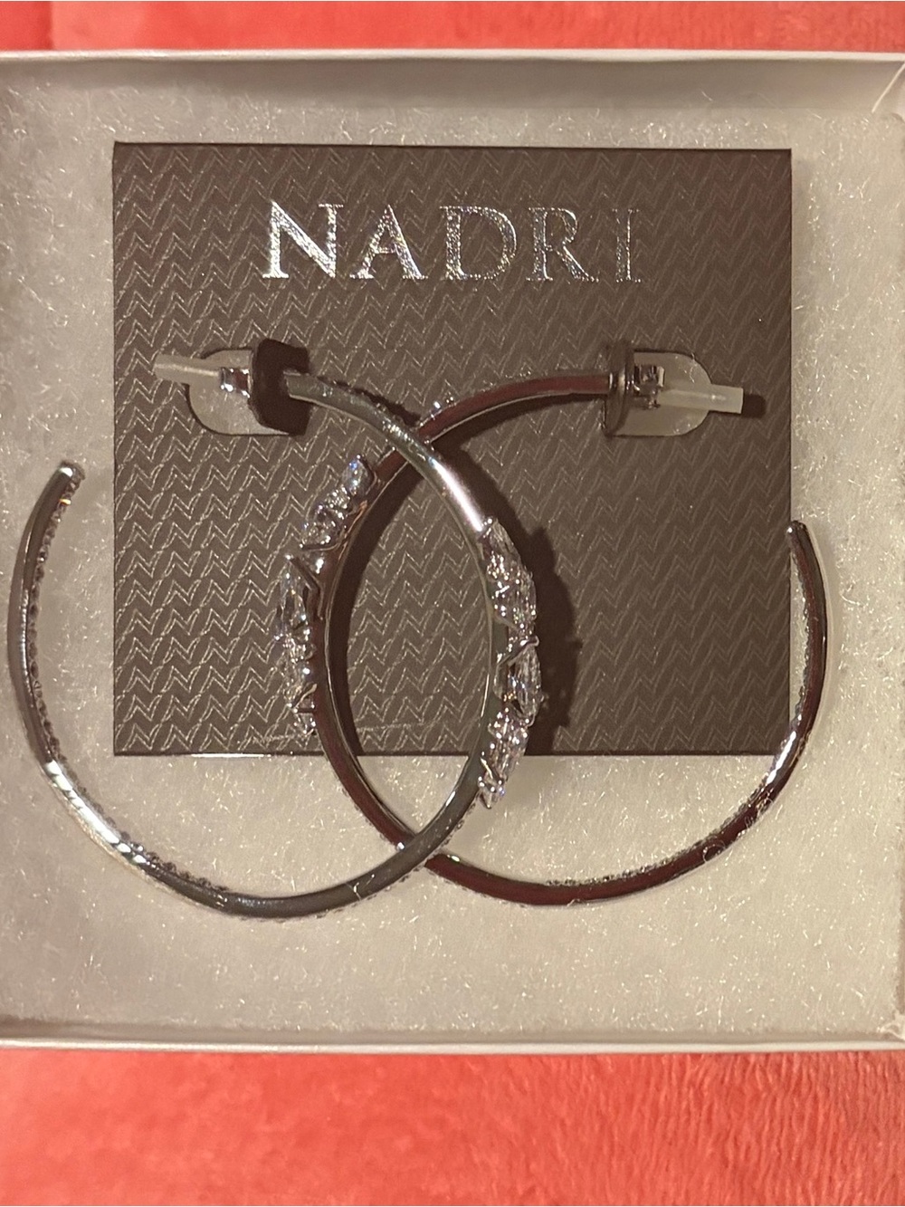 Nadri Silver Hoop Earrings with Crystal Accents